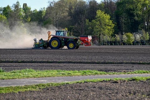 Tractor in a field, dryness, drought, near Achern, Ortenau district, Baden-Württemberg, Germany