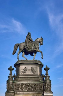 Equestrian statue King John Monument, blue sky with cirrus clouds, Theatre Square, Dresden, state