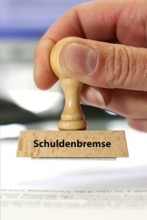 Stamp, wooden stamp, inscription: Schuldenbremse