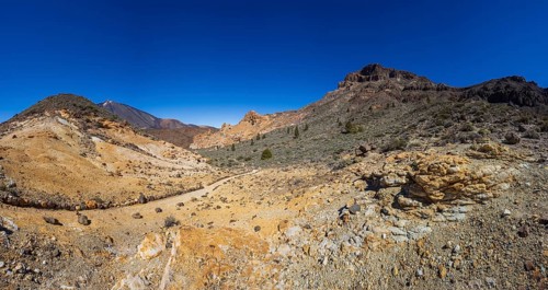 Mountain hiking on Montana Guajara, Canada del Capricho rock formation, Teide National Park,
