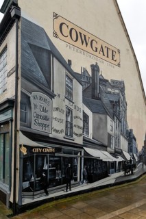 Cowgate mural of street in 1908 painted on end wall of building, Peterborough, Cambridgeshire,
