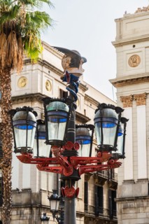 Lantern designed by Gaudi on the Plaça Reial in Barcelona, Spain