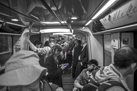 Metro fully staffed at rush hour, black and white, Paris France