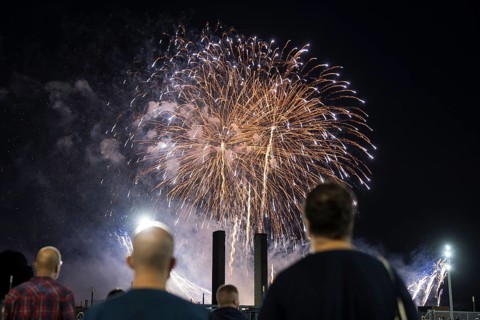Spectators watch the fireworks at the Pyronale on the Maifeld at the Olympic Stadium, Berlin,
