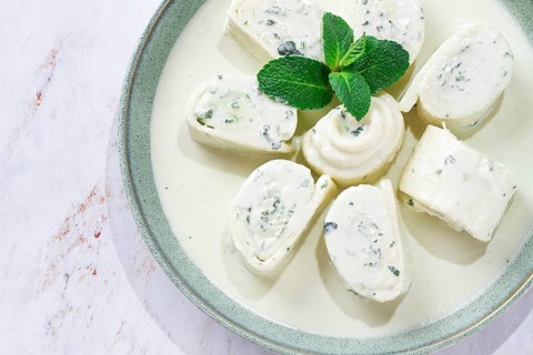 Gebjalia, Megrelian dish, cold appetizer of cheese with mint, Georgian traditional cuisine,
