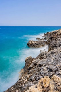 Romantic view over the sea in Koromacna Bay on a sunny day with rough seas on the island of Cres,
