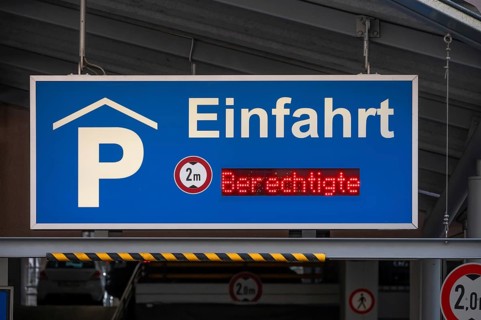 Information sign in front of a parking garage, Nuremberg, Middle Franconia, Bavaria, Germany