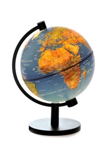 Illuminated terrestrial globe against white background