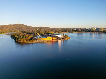 From above, this drone view of Canberra, the capital of Australia, featuring the serene waters of