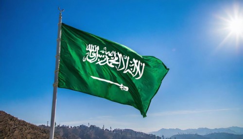 Flag, the national flag of Saudi Arabia flutters in the wind