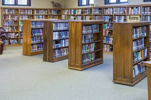 Books fill shelves at a small town library in Rockville, Indiana, USA