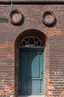 Front door and coat of arms of the house of the members of the Schutztruppe of the Lüneburg