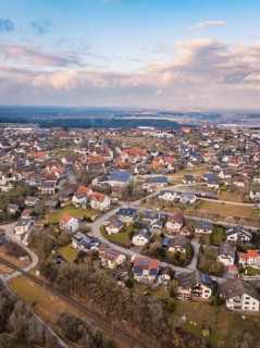 Bird's eye view of the town with various houses and cloudy sky, Schopfloch, Freudenstadt district,
