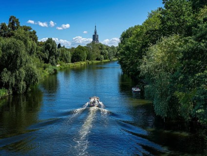 Small motorboat on the Havel at Freundschaftsinsel, Potsdam, Brandenburg, Germany