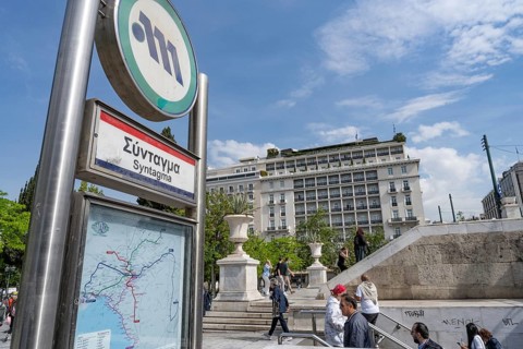 Athens, Greece. April 24th 2025. Commuters exit and enter the Syntagma Metro Station in downtown