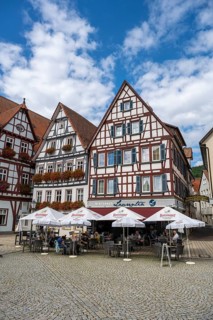 Half-timbered houses and inn on the market square of Bad Urach, Reutlingen district,
