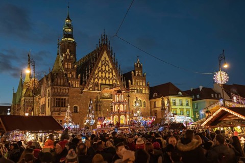 WROCLAW, POLAND - DECEMBER 08, 2018: Christmas fair in the market square of Wroclaw with the city