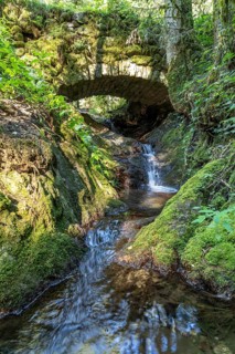 Historic stone bridge over the Gottschlägbach near Ottenhöfen in the Black Forest, Black Forest,