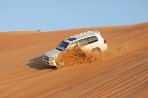 Car bashing dunes in the Wahiba Sands desert or Rimal Al Wahiba or Sharqiyya Sands, Janub