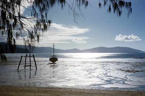 Melbourne Grammar School expedition to Queensland, Australia, 1956: yacht silhouette on the beach,
