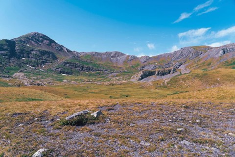 Journey through the lush terrain on hiking trails toward the stunning Ibones de Anayet, located in
