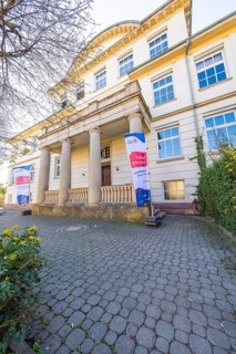 Facade of a historic building with banners of the 'Jugend musiziert' competition, Jugend Musiziert,