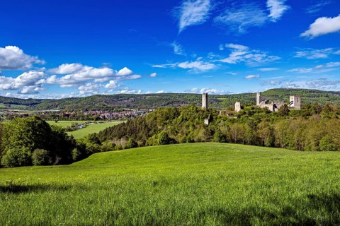 Wide green landscape with castle and bluish sky, The Brandenburg ruins near Gerstungen in Thuringia