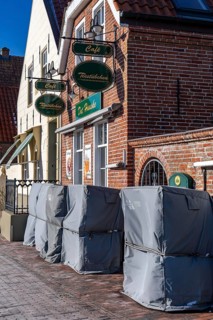 The fishing village of Greetsiel, municipality of Krummhörn, historic houses at the fishing
