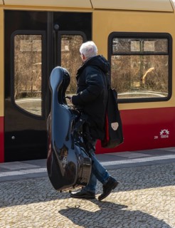 S-Bahn platform with passengers and the historic structures at Lichterfelde West station, Berlin,