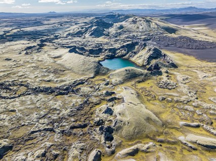 Lake in Tjarnargigur crater, moss-covered Laki crater or Lakagígar, series of craters, aerial view,