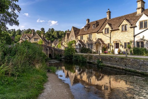 The village of Castle Combe on the River Bybrook, Cotswolds, Wiltshire, England, Great Britain
