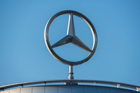 Large Mercedes logo in front of a clear sky on a roof, Mercedes star, Stuttgart-Untertürkheim,