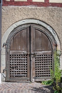 Old wooden Tor tor on a half-timbered house, in the old town centre of Meersburg on Lake Constance,