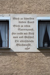 Slogan on a house of a manufacturer of metal wind instruments, Iphofen, Lower Franconia, Bavaria,