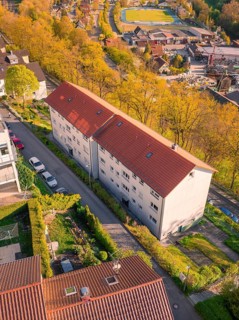 Close-up of residential buildings with red roofs in a green neighbourhood, Nagold, district of