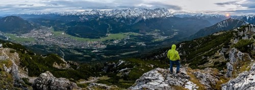 View Mountain panorama with Wetterstein mountains and Zugspitze, at sunset with sun star,