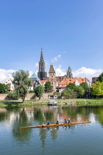 City view, Danube bank with historic old town, fishermen's quarter, cathedral, rowing boat, sports