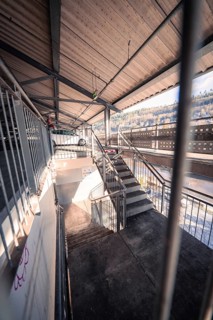 Staircase in a car park with railings and light from outside, Kaufland Calw multi-storey car park,