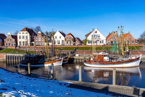 The fishing village of Greetsiel, historic fishing harbour, with the largest shrimp cutter fleet in