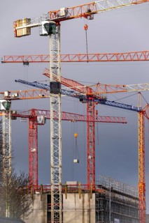 Construction cranes on 2 large construction sites Wohnbau, Geschäftsgebäude, Krefeld North