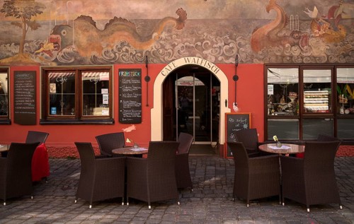 Facade painting by Toni Schönecker, fresco depicting the story of Jonah, Jonah in the whale, Café