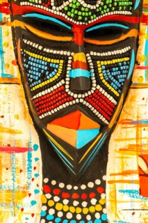Ghanaian woman as a three-dimensional work of art by a Ghanaian artist, a colourful work of art on