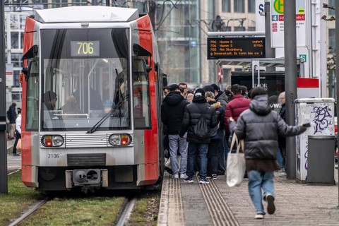 Full tram stop Schadowstraße, rainy weather, Düsseldorf, North Rhine-Westphalia, Germany