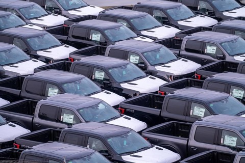 Ford FX4 pickup trucks on stockpile, in the overseas harbour of Bremerhaven, after import from the