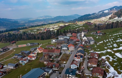 Drone image, residential buildings, settlement area, parish church, Riefensberg, Bregenzerwald,