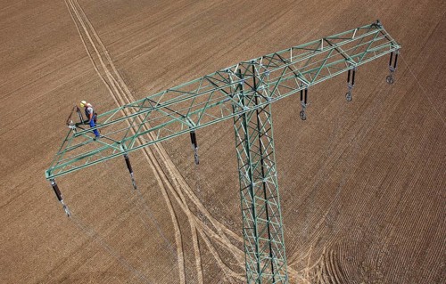 Bützow, DEU, 07.08.12, Aerial photoConstruction of new electricity pylons and power lines,