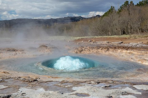 Strokkur is a fountain geyser located in a geothermal area in the southwest part of Iceland. It is