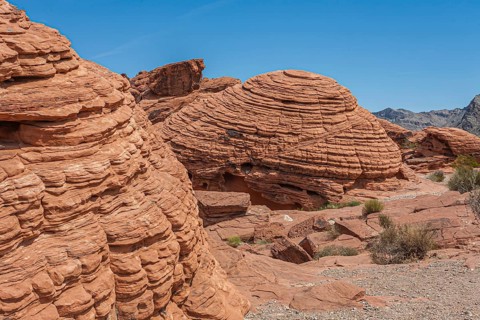 Beehive shaped red Aztec sandstone rock formations in the Valley of Fire State Park in Overton,