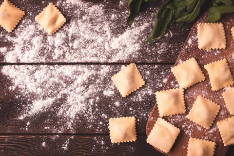 Cheese, Spinach ravioli, on a wooden table, selective focus, rustic style, horizontal, no people