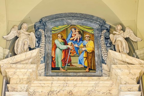 Mural ceiling painting with on the left apostle Paul with sword showing on the right apostle Peter
